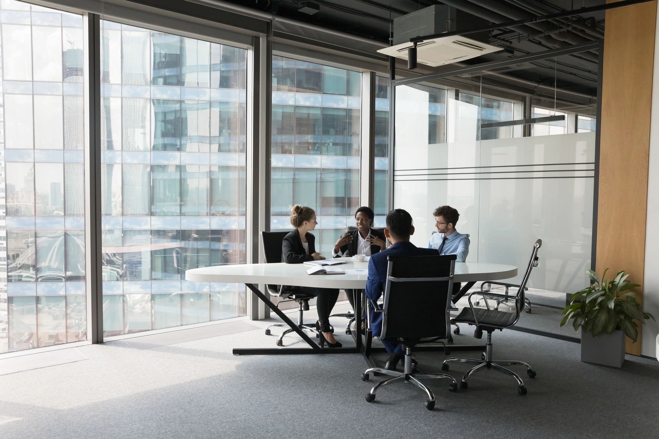 Diverse business team meeting in a modern office